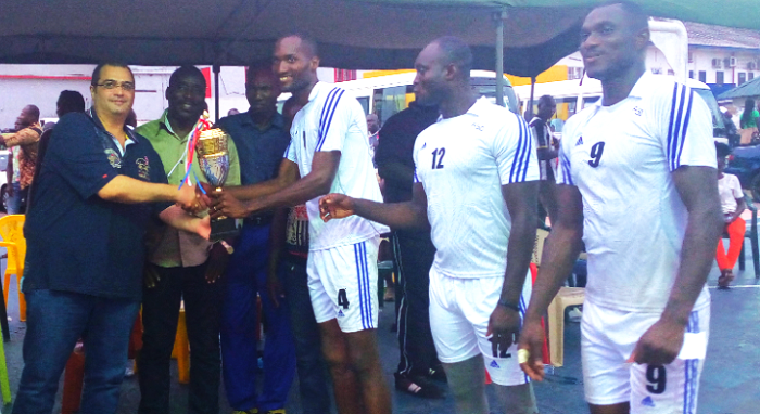 Mr. Nouhad Kalmoni, left, presents the trophy to Daniel Benefo, captain of the Army team Mr. Nouhad Kalmoni, left, presents the trophy to Daniel Benefo, captain of the Army team